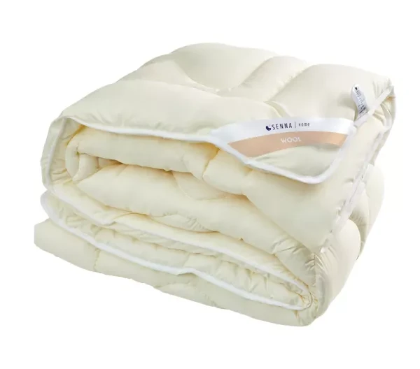Kołdra 155x200 Merino Wool kremowa Inter Widex - tkanina, kolor i codzienna pielęgnacja